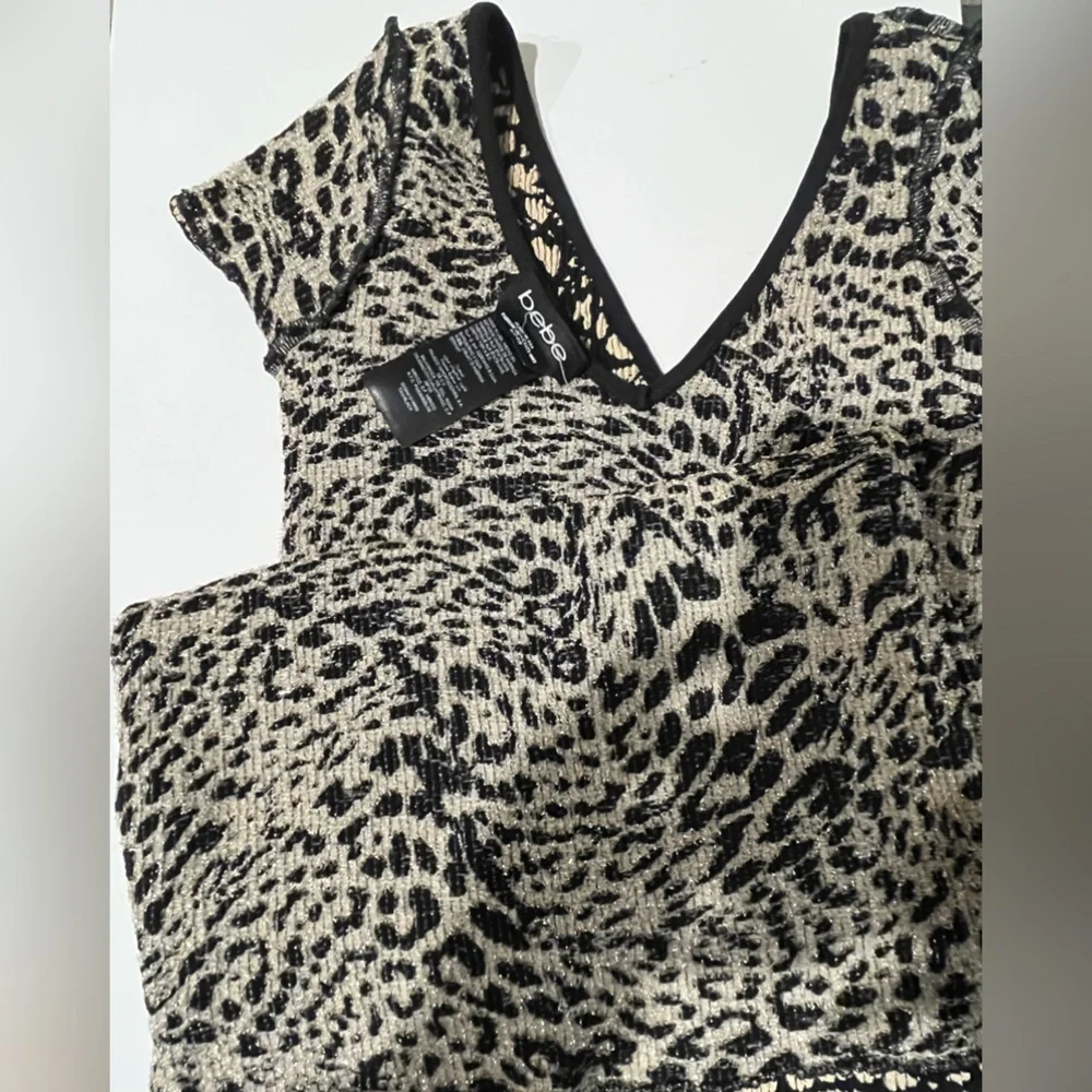 BEBE Stretch Nylon/Spandex w/Gold Metallic Accents Cap Sleeve “V”Neck Mini Dress - Picture 9 of 10